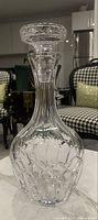 Full view of the vintage crystal decanter with stopper in place, showing intricate hand-cut details and elegant shape.
