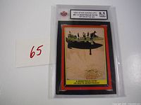 Front view of 1983 OPC Star Wars trading card #41 'A Monstrous Fate' from Return of the Jedi inside clear graded slab with grading label showing 8.5 NM+ condition.