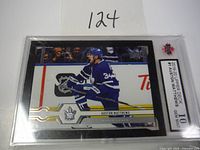 Front view of the 2019-20 Upper Deck Auston Matthews hockey card in slab graded KSA 10 Gem Mint.
