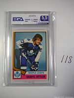 Front view of Darryl Sittler hockey card in EGA graded case showing grade and player image