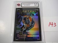 Close-up of one graded Wayne Gretzky McDonald's hockey card with holographic details.
