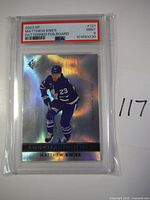 Front view of the graded Matthew Knies rookie card with PSA Mint 9 label.