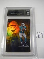 2020 Tua Tagovailoa Illusions football rookie card graded Gem Mint 10 in protective slab, showing front holographic design with orange and black tones.
