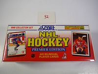 Front view of the factory sealed box of the 1990 Score NHL Hockey Premier Edition set showing branding and included player cards.