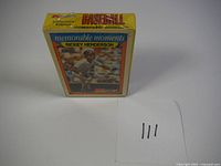 Box with yellow background showing the top of the unopened 1988 K-Mart Memorable Moments baseball card set featuring Rickey Henderson.
