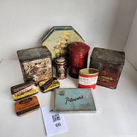 Photo capturing all vintage tins in assortment, various shapes and sizes, highlighting a diversity of designs including a ship, post box, and spice tins.