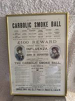 Gold metal framed Carbolic Smoke Ball vintage advertisement print measuring about 11x17 inches.