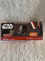 Front of boxed Star Wars Air Hogs remote control Speeder Bike with Stormtrooper figure inside shown through clear window. Box includes Star Wars logo and age recommendation 6+. Shows slight box wear.