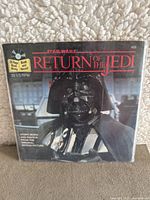 Front cover of sealed Star Wars Return of the Jedi vinyl record featuring Darth Vader.