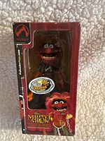 Front view of Animal figure in original box with window, Canadian Exclusive sticker visible