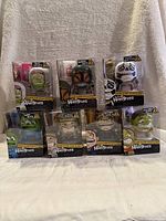 Full lot of 7 new The Hangrees parody collectible figures in sealed packages.