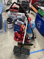 Overall lot with vacuum, brushes, fluids, and accessories