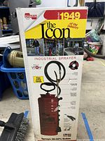 Box front showing Chapin logo and image of the industrial sprayer with ergonomic pump handle and hose attachment.