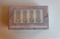 Boxed set of 4 champagne flutes decorated with gold dots and names (Sophie, Ella, Chloe, Becky) on the box front