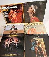 Front view of selected album covers including Neil Diamond Gold, Olivia Newton-John Physical, Kenny Rogers, Barbara Streisand, and others to visually verify artists and condition.