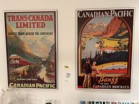 Two posters side by side on wall