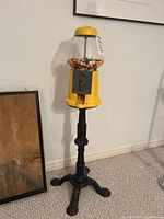 Full view of assembled gumball machine and stand