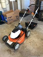 Overall view of Stihl RMA 510 CA cordless lawn mower with folded handles, no battery