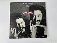 Front cover photo of The Fugs vinyl record album showing two men and the band logo