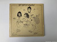 Front cover of The Who's 'By Numbers' album showing caricature cartoon illustration of band members.