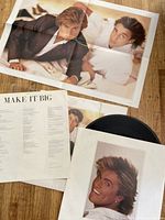 Vinyl record, sleeve with photo of band members, and lyric insert for Ah Ha's Make It Big album.