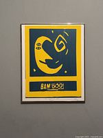 Frontal view of framed screen print showing abstract yellow and dark blue design with 'BAMBOO' text on white paper, titled and signed by artist in pencil beneath print.