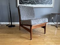 Front quarter view showing overall form and cushion profile