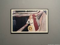 Full front view of the framed artwork showing two girls on a bridge with muted color palette and black frame