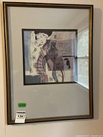 Full front view of framed Geisha art print showing overall condition, frame, and matting.