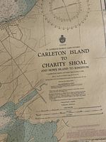 Nautical map titled 'Carleton Island to Charity Shoal and Howe Island to Kingston' with navigation details and compass rose, printed by Canadian Hydrographic Service.