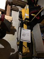 Ryobi electric log splitter laid out showing overall condition and included manual