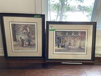 Both framed Trisha Romance prints leaning against window; shows overall lot