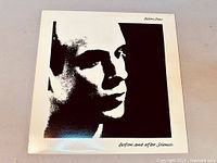 Front cover of 'Before and After Science' album showing stylized monochrome portrait of Brian Eno.