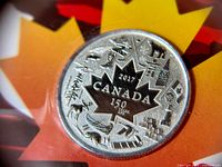 Close-up front view of the 2017 Canada $3 pure silver coin showing the maple leaf design with Canadian symbols and inscriptions.