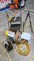 Full lot showing metal 2-step footstool, white 1-step footstool, Power Roller 959 box, electric sander/polisher with cord and metal sawhorse tripod stand
