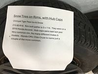Note detailing tire brand, size, and compatibility information for 4 Uniroyal snow tires on rims with hub caps.