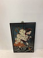 Full view of the lacquered wood panel portrait showing the Asian lady crouching in traditional kimono design with fish and water elements below