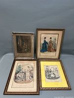 Group of 4 framed French fashion prints shown together, highlighting different frame styles and print sizes
