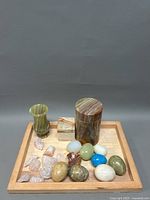 Full lot display showing all items including vase, jar, box, polished stone eggs, and rough quartz pieces on wooden tray