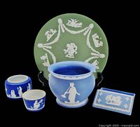 Photo displays all items in the lot together showing their color, style and size relative to each other.