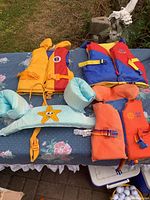 All four life jackets laid out