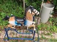 Full view of Wonder Horse on blue frame