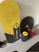 Full set of Nalanda balance board, black roller, and Everlast red boxing speed bag on its platform