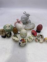 Front view showing grouping of decorative eggs and white ceramic rabbit figurine