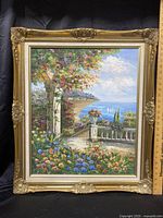 Full front view of framed oil painting showing Mediterranean garden terrace overlooking the sea, ruler placed at right for scale