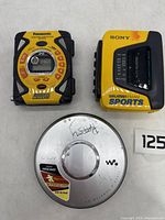 Top view of all three devices showing front facing controls and branding.