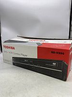 Front of Toshiba box showing model SD-V296 and DVD/VCR combo label