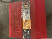 Red slipcase with Bateman branding and wildlife artwork on cover band for two-volume deluxe edition.