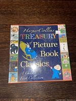 Front cover of the sealed HarperCollins Treasury of Picture Book Classics book showing the title and colorful children's illustration.