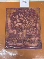 Full view of batik on silk piece showing the entire tree design with purple and gold colors.